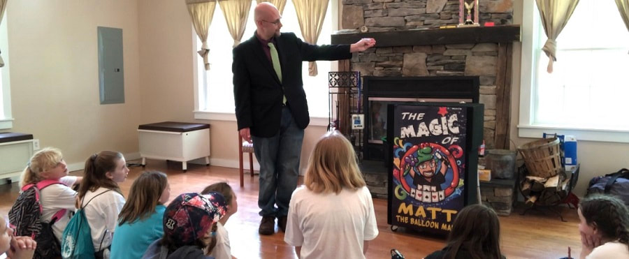 Magician Matt Matthews teaches magic at Girl Scout Camp